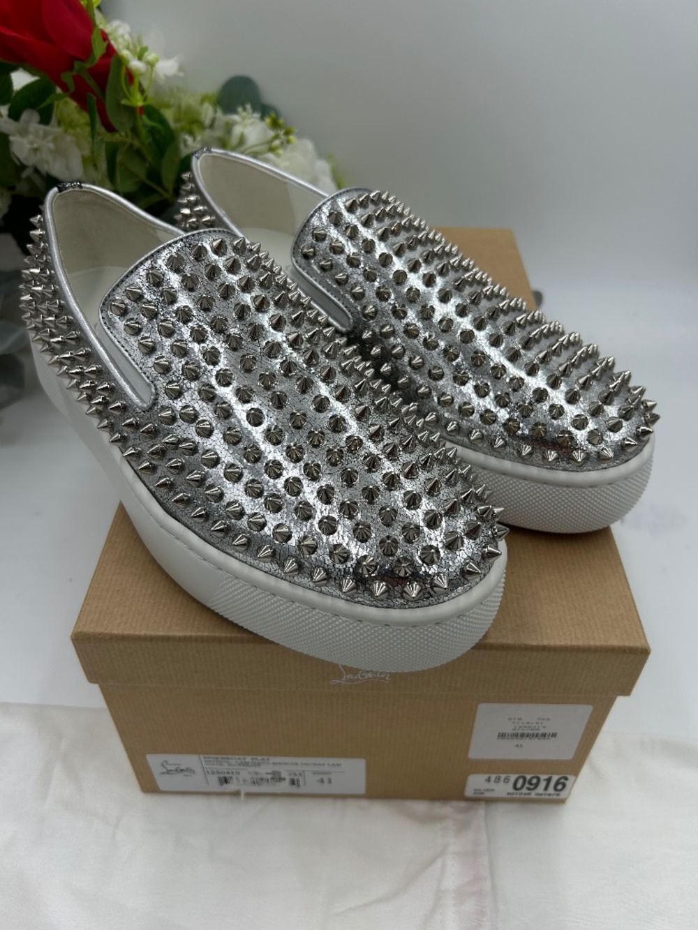 Men’s Christian Louboutin, spike boat leather sneakers, size 41. Made in Italy.